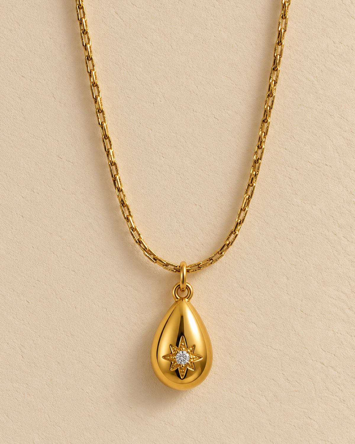 Golden Teardrop Starburst Pendant Necklace
