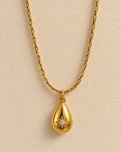 Golden Teardrop Starburst Pendant Necklace