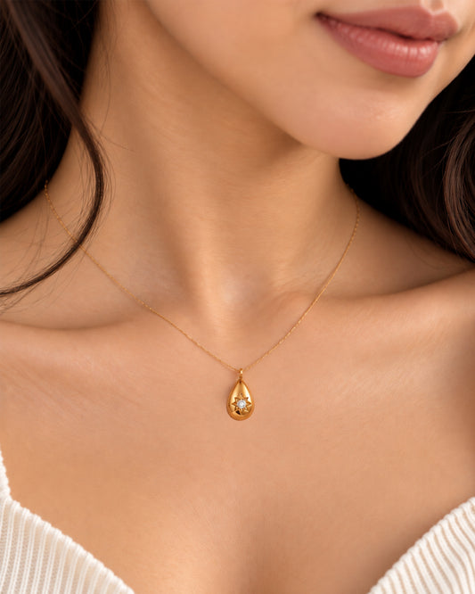 Golden Teardrop Starburst Pendant Necklace